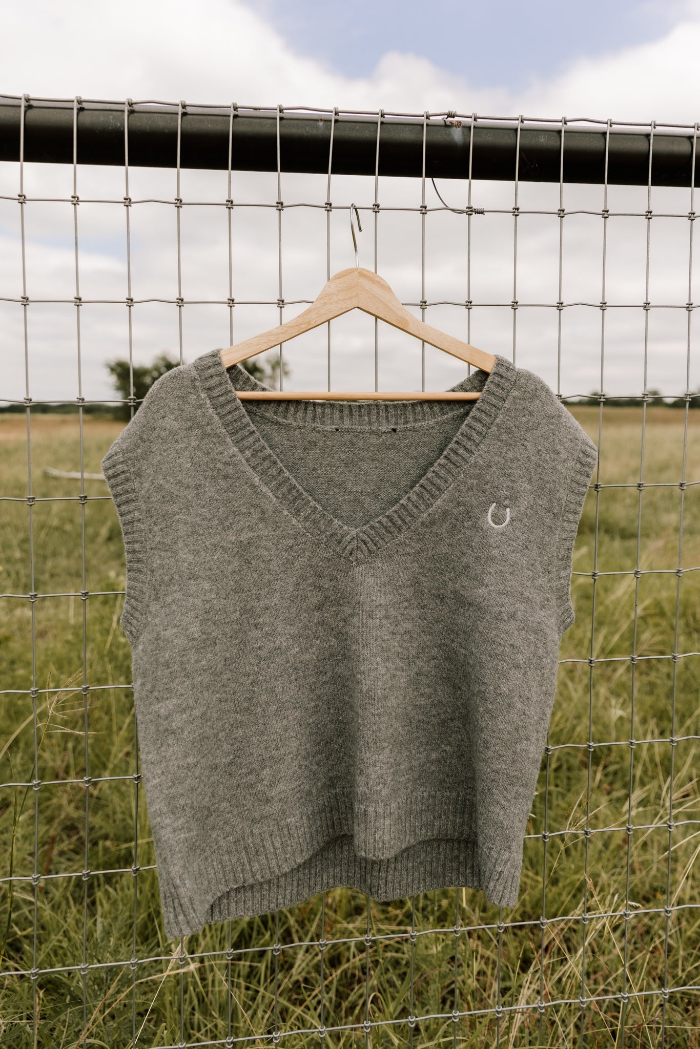 The Embroidered Horseshoe Sweater Vest in Grey
